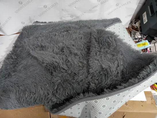 LARGE GREY FUR COVERED RUG