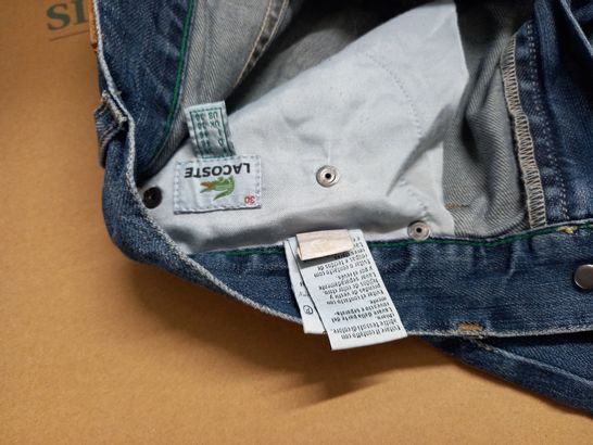 PAIR OF LACOSTE JEANS - UK 30