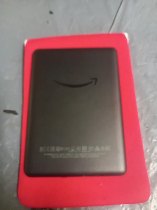 UNBOXED KINDLE JPG29R E-READER IN RED POUCH