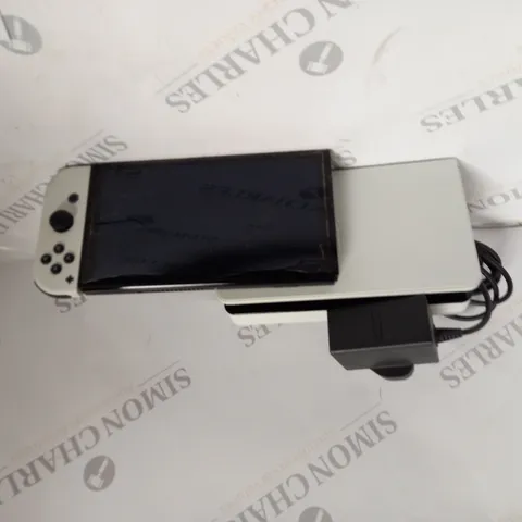 NINTENDO SWITCH AND CHARGING STATION 
