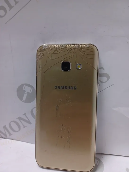 BOXED SAMSUNG GALAXY A3 MOBILE PHONE IN GOLD