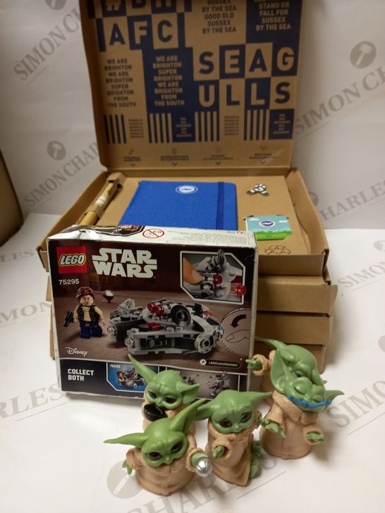 LOT OF ASSORTED ITEMS TO INCLUDE LEGO 75295 STAR WARS MILLENNIUM FALCON MICROFIGHTER TOY, STAR WARS BABY YODA MINIATURE FIGURES, AND 4 X BRIGHTON FOOTBALL CLUB STATIONARY GIFT SET
