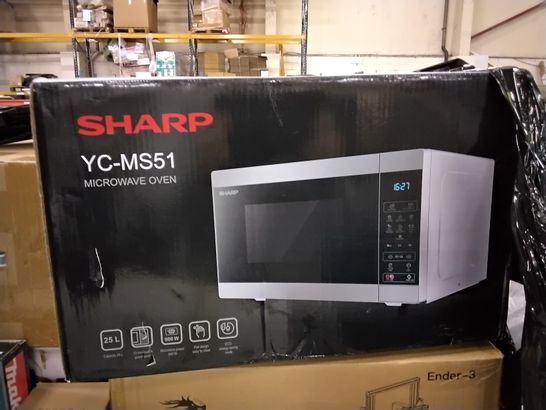 PALLET OF ASSORTED ITEMS TO INCLUDE; SHARP YC-MS51 MICROWAVE OVEN AND A MAKITA ELECTRIC CHAINSAW.
