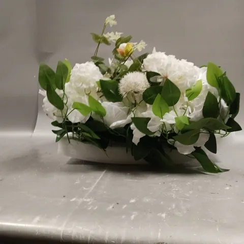 BUNCH OF WHITE AND GREEN FAKE FLOWERS