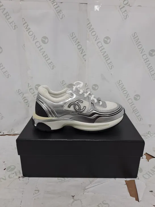 BOXED PAIR OF CHANEL SHOES IN WHITE/BLACK/METALLIC SILVER EU SIZE 39