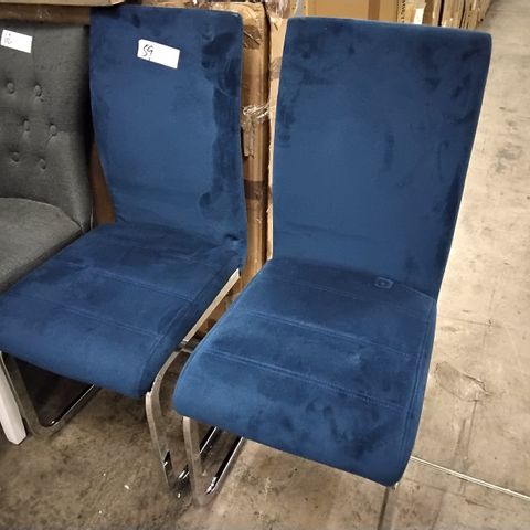PAIR OF BLUE VELVET UPHOLSTERED DINING CHAIRS ON CHROME SUPPORTS 