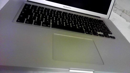 SILVER APPLE MACBOOK PRO 15" SCREEN