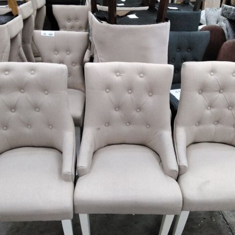 DESIGNER CREAM FABRIC CHAIRS WITH BUTTONED BACK, SMALL ARM RESTS AND WHITE LEGS