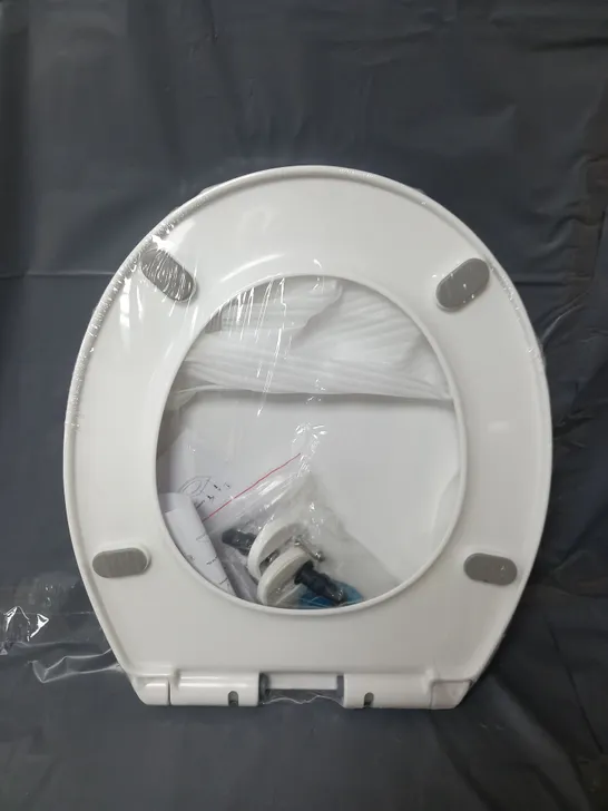 SEALED TOILET SEAT IN WHITE