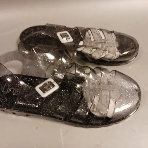 LARGE QUANTITY OF ASSORTED LINZI CLEAR GLITTER  PLASTIC SANDALS - VARIOUS SIZES