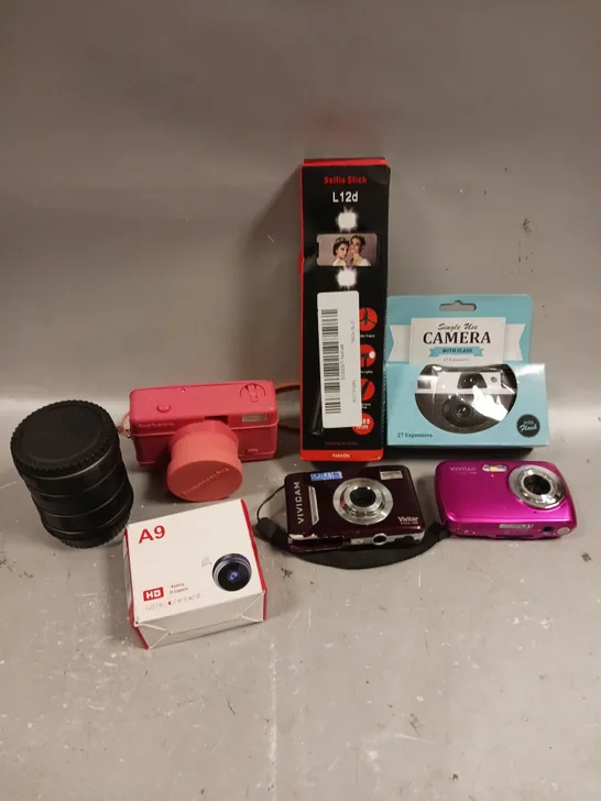 APPROXIMATELY 10 ASSORTED CAMERA PRODUCTS/ACCESSORIES TO INCLUDE DIGITAL CAMERAS, PHOTO PAPER, IP CAMERA ETC 