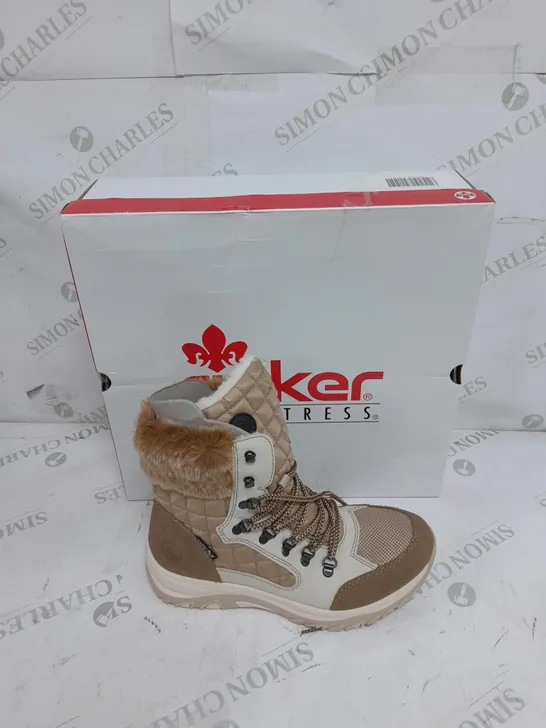 BOXED PAIR OF RIEKER CREAM WINTER FUR HIKE BOOTS IN SIZE 5 