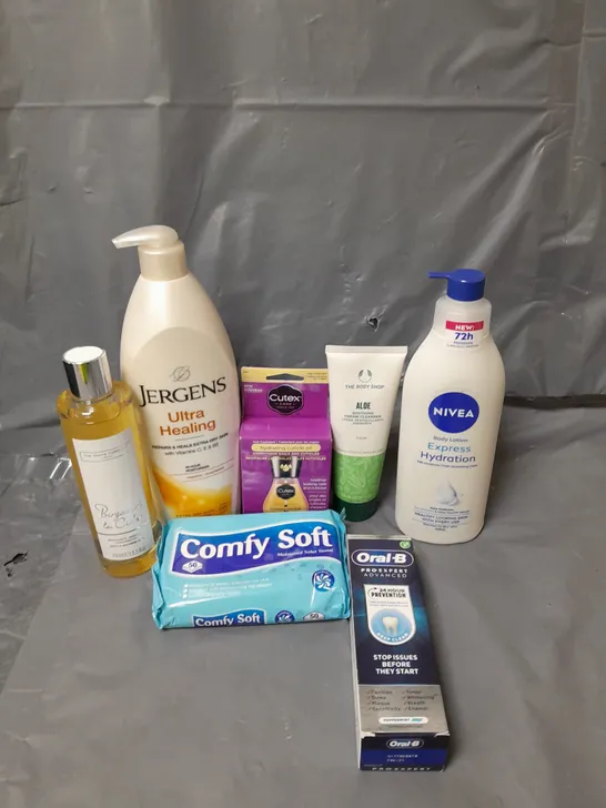 APPROXIMATELY 20 ASSORTED COSMETICS PRODUCTS TO INCLUDE - ORAL B PRO EXPERT ADVANCED TOOTHPASTE - THE BODY SHOP CREAM CLEANSER - COMFY SOFT TOILET TISSUE WIPES - ETC 