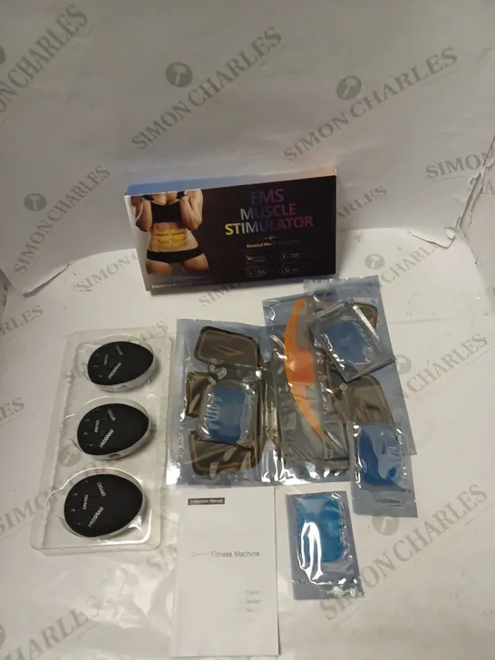 BOXED EMS MUSCLE STIMULATOR WITH 3 CONTROL UNITS, A SELECTION OF PADS PLUS INSTRUCTIONS