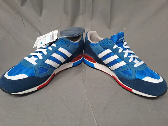 BOXED PAIR OF ADIDAS ZX750 SHOES IN BLUE/WHITE/RED UK SIZE 10