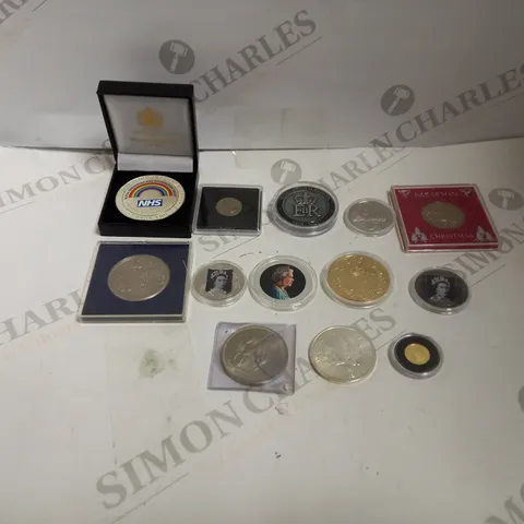 LOT TO CONTAIN APPROX. 13 ASSORTED DECORATIVE AND COMMERATIVE COINS, DESIGNS AND THEMES VARY