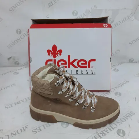 BOXED PAIR OF RIEKER LACE UP CHUNKY BOOTS IN CREAM SIZE 7