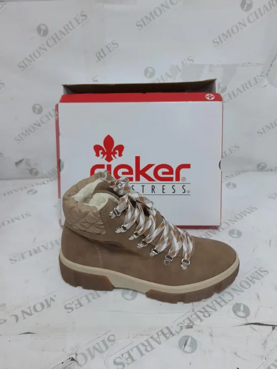 BOXED PAIR OF RIEKER LACE UP CHUNKY BOOTS IN CREAM SIZE 7