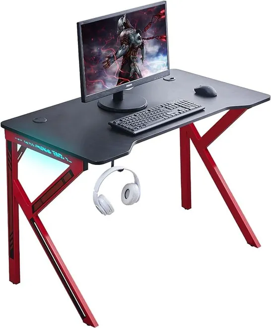 BOXED CLIPOP BLACK GAMING COMPUTER DESK WITH 7 COLOUR RGB LIGHTING WITH CARBON FIBRE TABLE TOP (1 BOX)