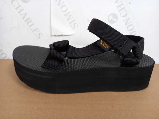 BOXED PAIR OF TEVA PLATFORMS (BLACK), SIZE 6 UK