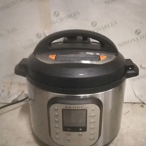 BOXED INSTANT POT  MULTI USE PRESSURE COOKER 