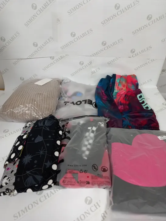 LARGE BOX OF ASSORTED CLOTHING ITEMS IN VARIOUS COLOURS AND SIZES INCLUDING TROUSERS , TOPS AND JUMPERS 