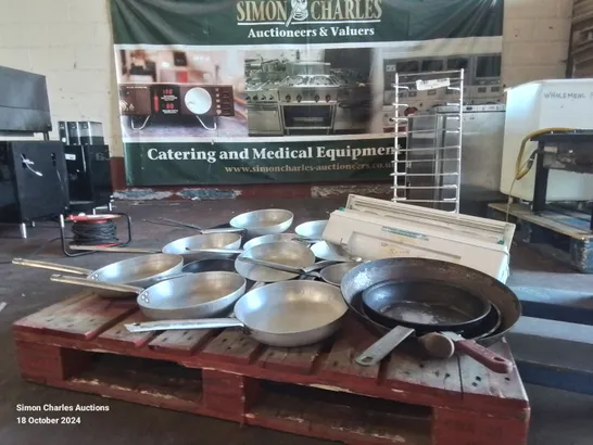 LARGE AMOUNT OF COMMERCIAL FRYING PANS AND STAINLESS STEEL PLATE RACK AND FOOD PACKAGING CUTTER