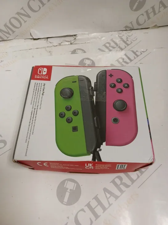 BOXED NINTENDO SWITCH CONTROLLER - GREEN & PINK
