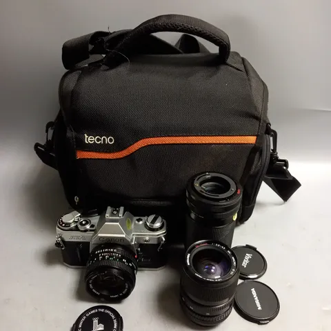 CANON AE-1 SLR CAMERA WITH 2 SPARE LENSES AND TECNO CAMERA BAG