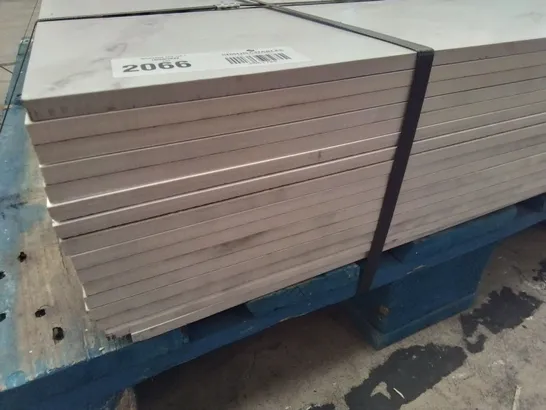 PALLET CONTAINING 16 WHITE MARBLE EFFECT PORCELAIN TILES EACH 1200 × 600