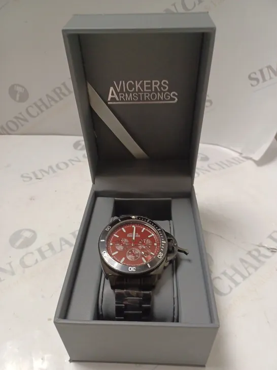 BOXED VICKERS ARMSTRONGS GEOSPHERE CHRONOGRAPH MOVEMENT RED DIAL BLACK CHAIN STRAP WATCH