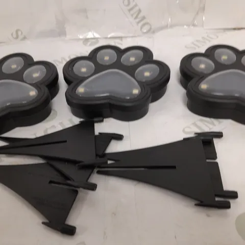 BOXED BELL AND HOWELL SET OF 4 SOLAR PAW LIGHTS