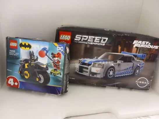 TWO ASSORTED LEGO PRODUCTS TO INCLUDE; SPEED CHAMPIONS FAST AND FURIOUS 76917 2 FAST 2 FURIOUS NISSAN SKYLINE GT-R(R34) AND 76220 BATMAN VERSUS HARLEY QUINN