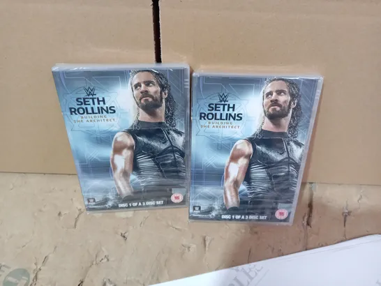 LOT OF 2 SETH ROLLINS DVDS AND ASSORTED REMOTE BACK CASES