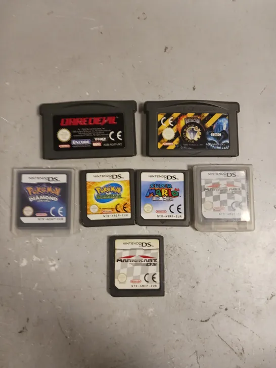 7 X ASSORTED LOOSE CARTRIDGE VIDEO GAMES TO INCLUDE POKEMON DIAMOND, MARIOKART DS, DAREDEVIL ETC 