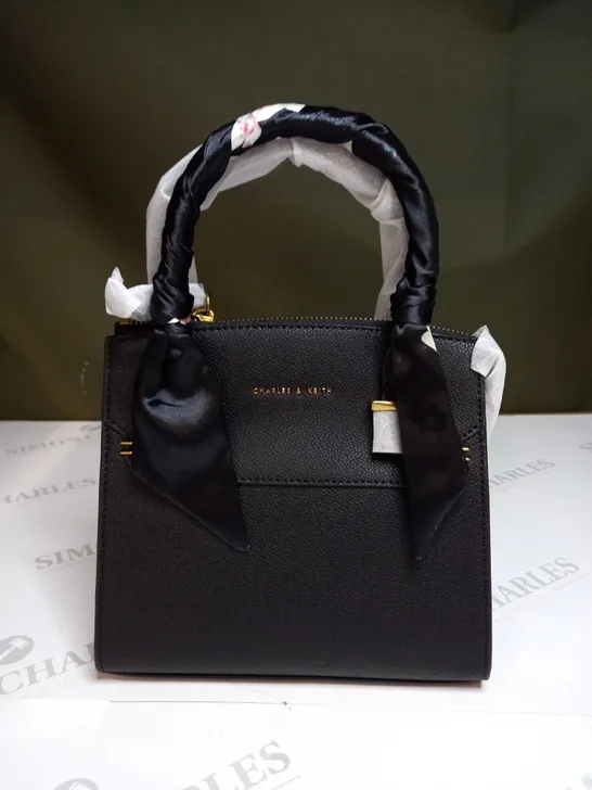 CHARLES AND KEITH ZIPPED LEATHER HANDBAG 