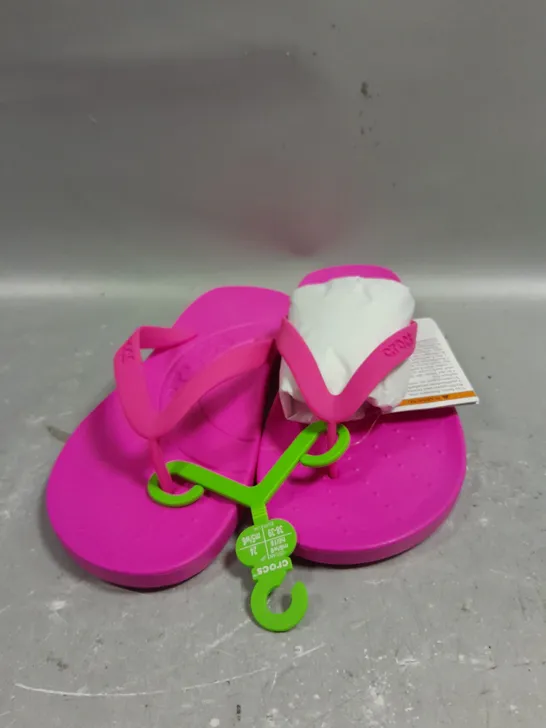 PAIR OF CROCS FLIP FLOPS IN PINK CRUSH - 6-8