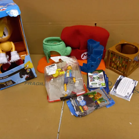 LOT OF 6 ITEMS INCLUDING SONIT THE HEDGEHOG CONTROLLER AND PHONE STAND, MARIO HAT, POKEMON, STAR WARS AND MINECRAFT TRADING CARDS