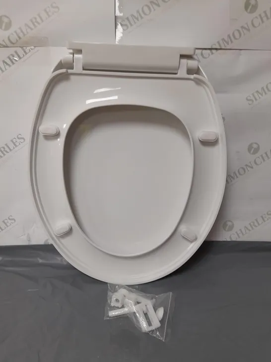 WHITE PLASTIC REQUISITE NEEDS TOILET SEAT