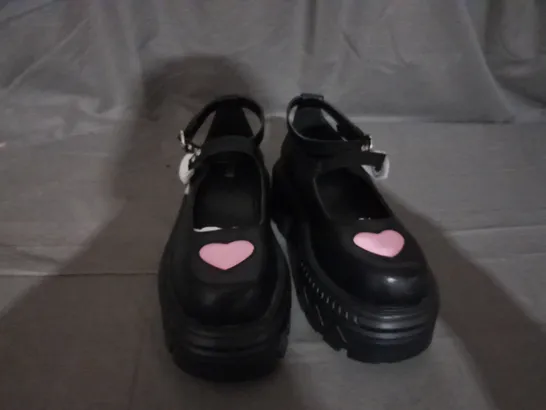 PAIR OF KOI HEART STOMPERS IN BLACK SIZE 6