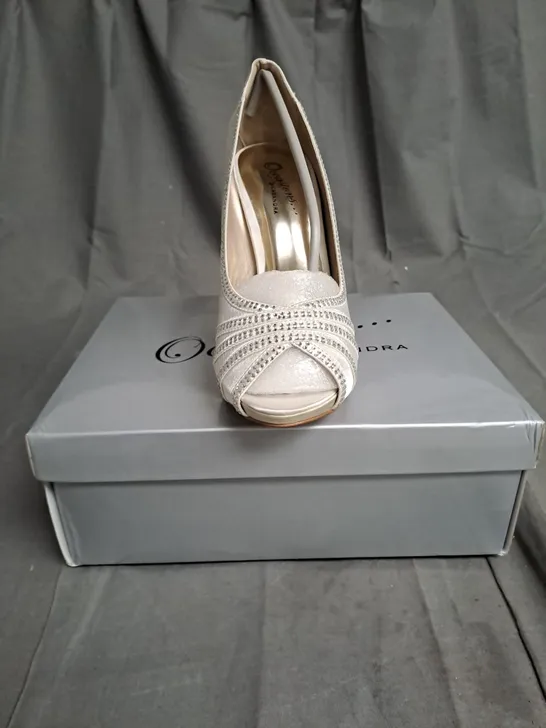 BOXED LOT OF 13 PAIRS OF LADIES OCCASIONS BY CASANDRA HIGH HEELED SHOES. VARIOUS SIZES