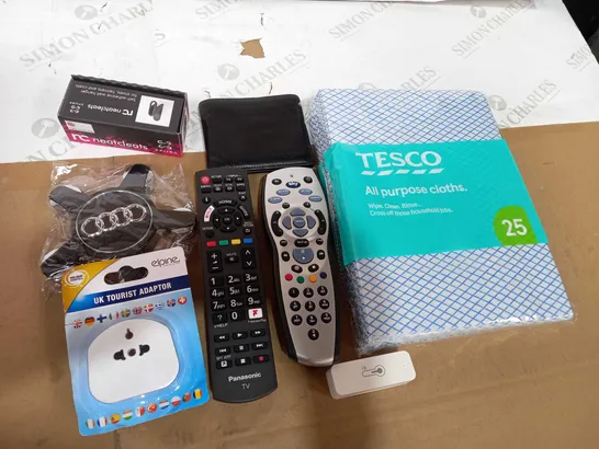 BOX OF ASSORTED HOUSEHOLD ITEMS TOO INCLUDE TV REMOTES AND WALLETS 