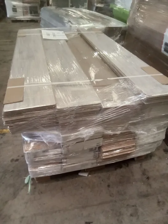 PALLET OF ASSORTED WOODEN LAMINATE FLOORING 26 PACKS OF 7 PLANKS