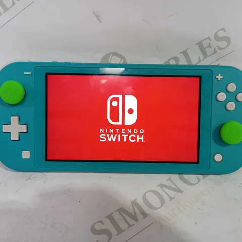 BOXED NINTENDO SWITCH LITE IN CYAN