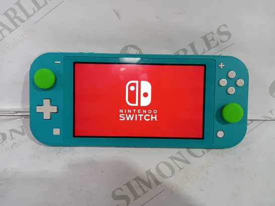 BOXED NINTENDO SWITCH LITE IN CYAN