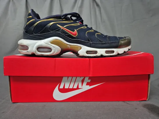 BOXED PAIR OF NIKE AIR TN SHOES IN NAVY/GOLD/RED UK SIZE 9.5