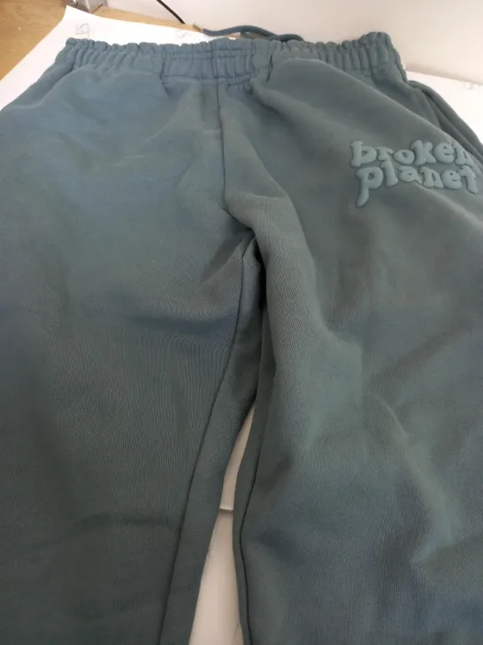 BROKEN PLANET HEAVY RAISED LOGO BOTTOMS IN SEA GREEN - SMALL