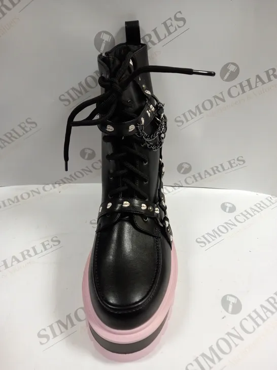 PAIR OF KOI FOOTWEAR YAMI PASTEL BLACK/PINK PLATFORM BOOTS - 7