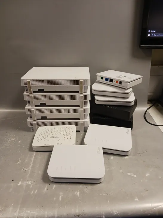 LOT OF ASSORTED HOUSEHOLD ITEMS TO INCLUDE LCOTERA RESIDENTIAL WIFI 6 ETHERNET ROUTER , ADTRAN SDX 622V  , ETC