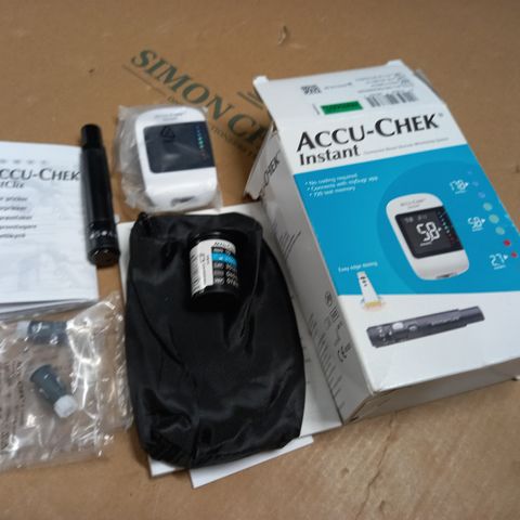 ACCU-CHEK INSTANT BLOOD GLUCOSE MONITORING SYSTEM